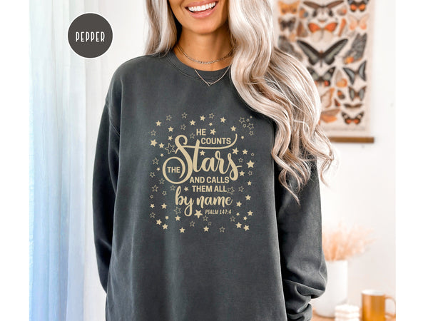 Psalm 147 - He Counts The Stars Christian Sweatshirt | Comfort Colors Sweatshirt Hover