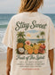Person wearing a t-shirt with a tropical fruit design and scripture tee